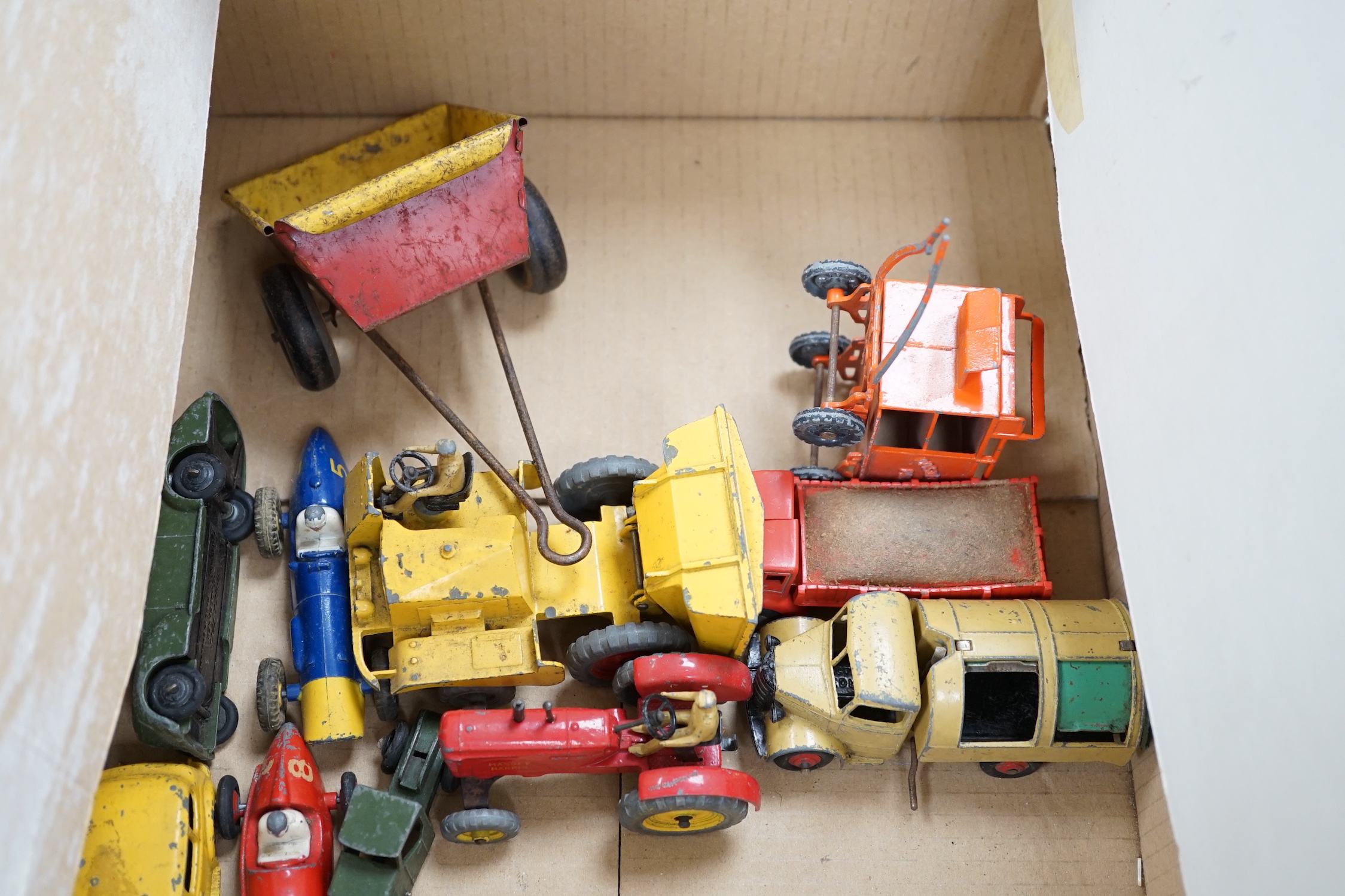 Twenty Dinky toys for restoration, including a Hudson Sedan, Loudspeaker van, Double deck Bus, Vanguard, etc. together with a Marx tinplate tractor crawler and a Tri-ang Minic caravan